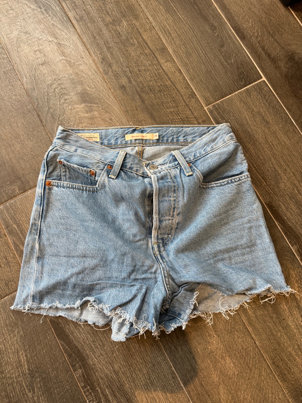 Levi's Light Blue Raw Hem Denim Shorts